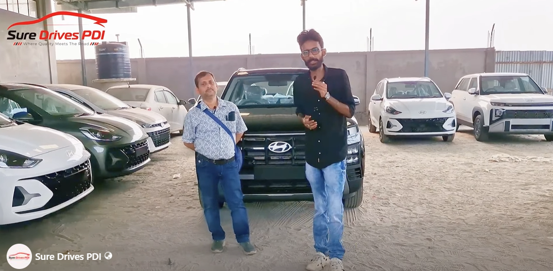 Sure Drives PDI inspector with a customer during a pre-delivery inspection in Jalpaiguri